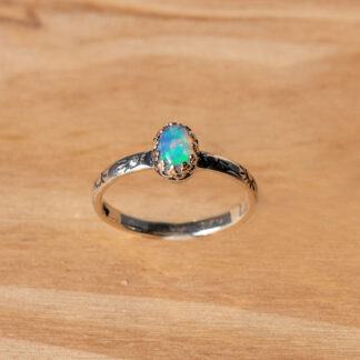 Ethiopian opal ring with sun patterns